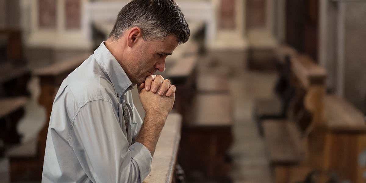 web3-man-praying-church-god-faith-stokkete-shutterstock